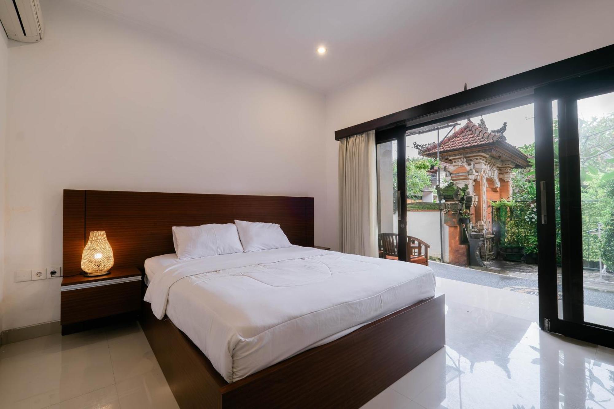 Puri Kasih Home Stay Санур Экстерьер фото