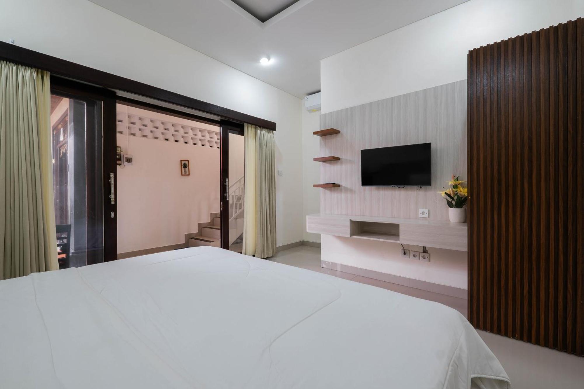 Puri Kasih Home Stay Санур Экстерьер фото