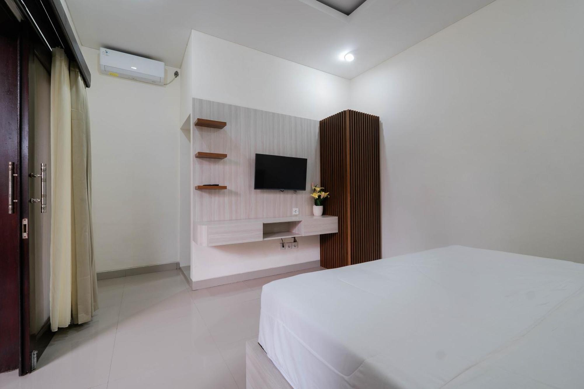 Puri Kasih Home Stay Санур Экстерьер фото
